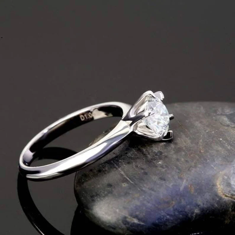 Six-Prong Sparkling Moissanite Ring .jpg